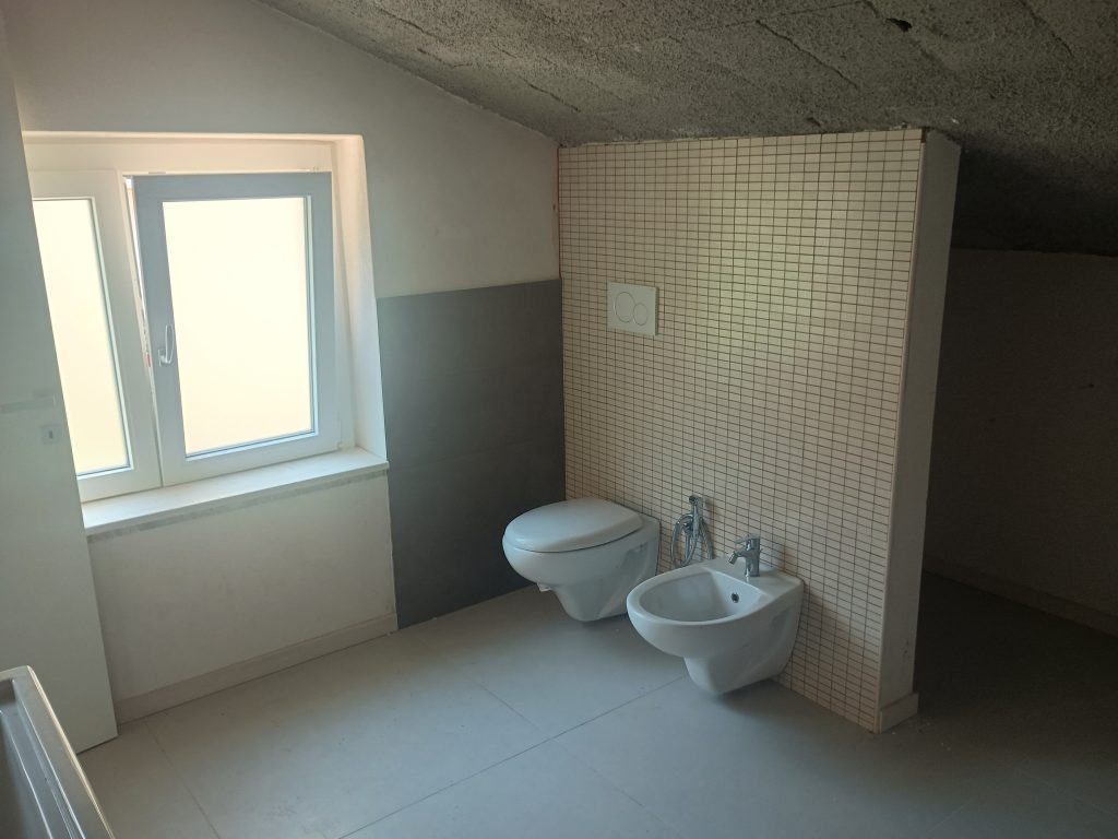 Detached house in the urban centre (via Bovio 25A)