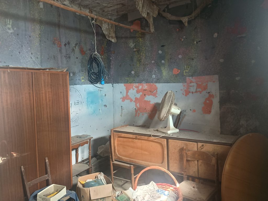 Casa indipendente con terreno nel centro urbano (via Alfieri, 12)